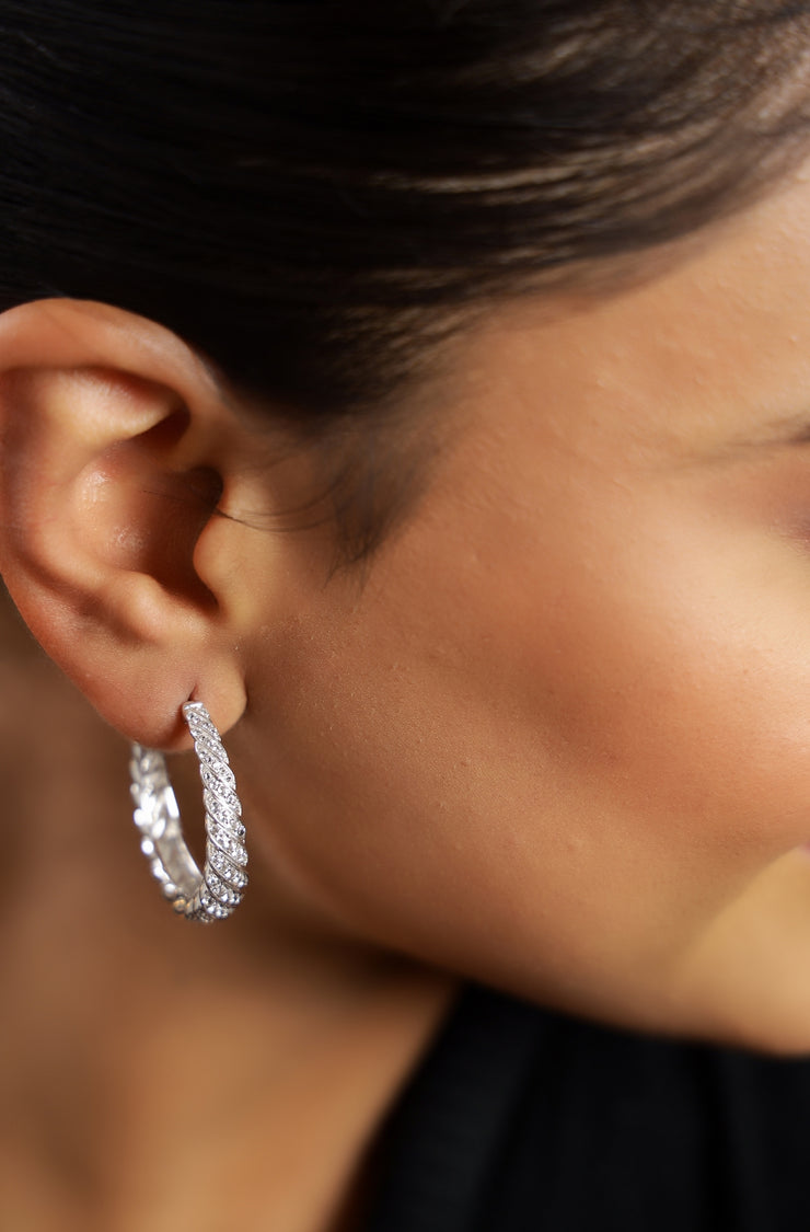 Pure silver with white finish and white sapphire stones earring