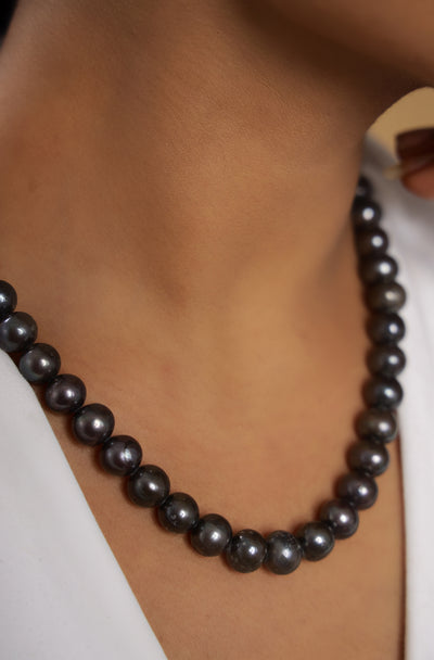 Pure silver with 18k gold plating and natural black color pearls