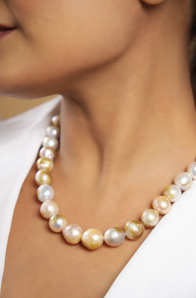 Pure silver with 18k gold plating and natural multi color pearls