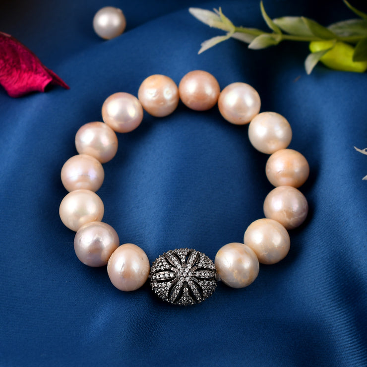 Pearl stretchy bracelet with real silver and cz bead